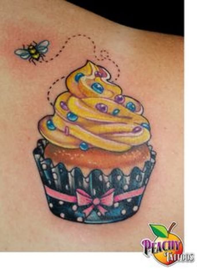 Colorful Cupcake With Flying Bee Tattoo Design