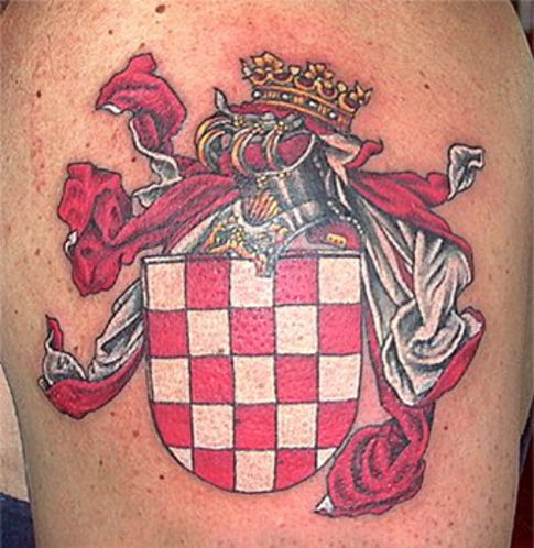 Colorful Family Crest Tattoo On Man Shoulder