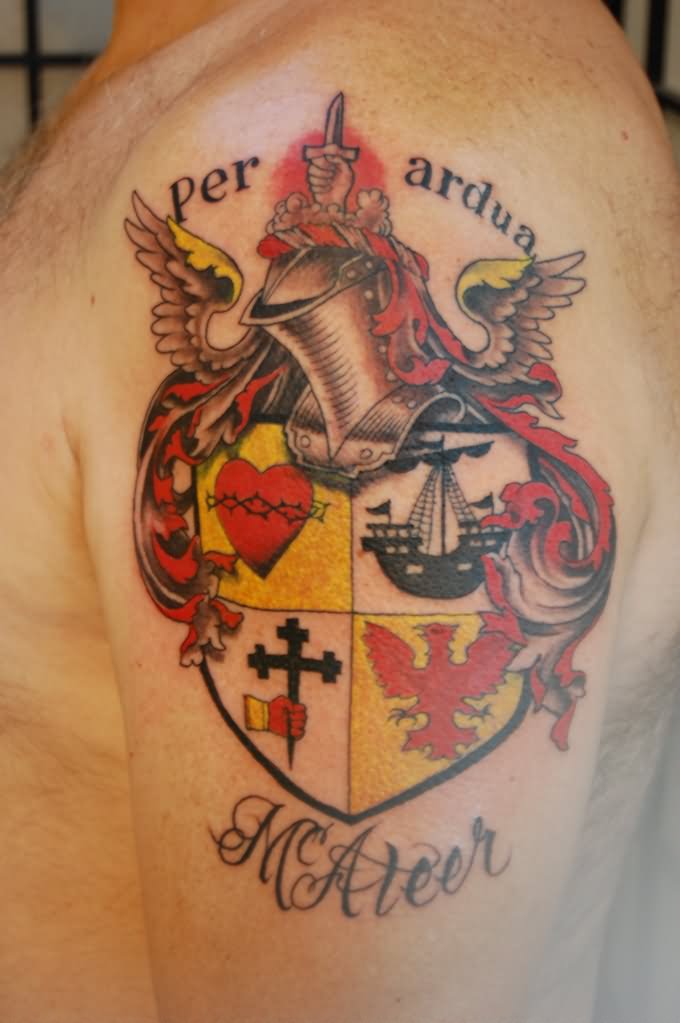 Colorful Heart, Cross, Ship And Eagle In Caban Family Crest Tattoo On Shoulder