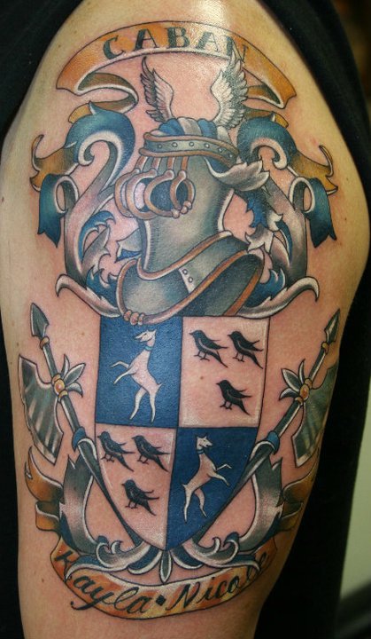 Colorful Horse And Bird In Caban Family Crest Tattoo On Shoulder By Teresa