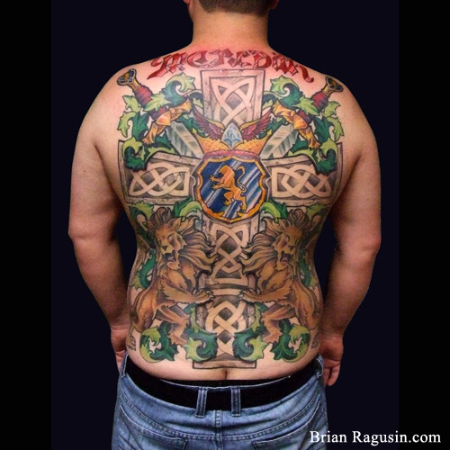 Colorful Two Lion And Dagger In Family Crest Tattoo On Man Full Back