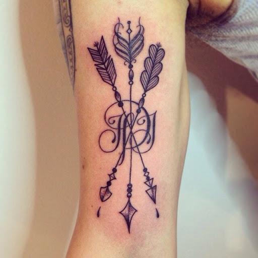 Crossing Arrow Tattoos On Arm