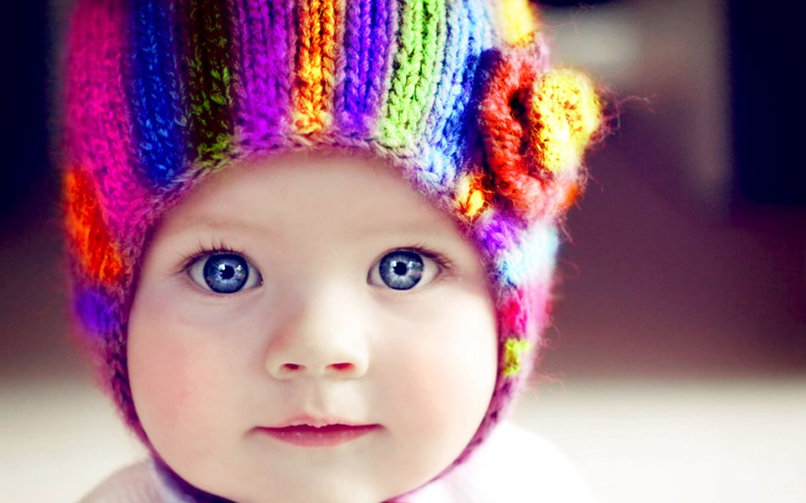 Cute Baby Wearing Rainbow Color Skullcap Picture