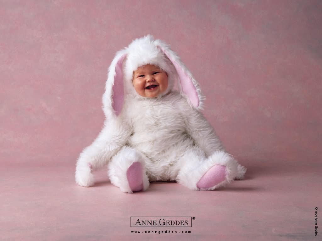 Cute Laughing Baby In White Bunny Dress