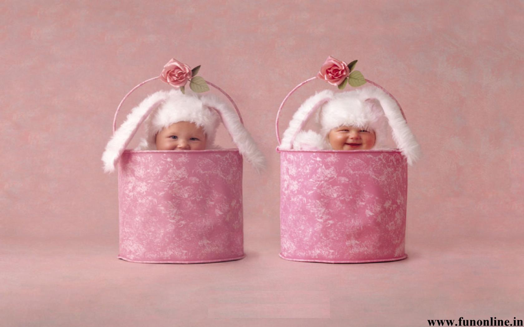 Cute Twin Babies In Bunny Costume Sitting In Basket Wallpaper