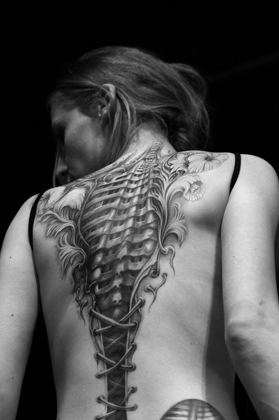 Grey Corset Bow Tattoo On Girl Full Back by Wojtek