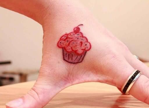 Little Red Cupcake Tattoo On Hand
