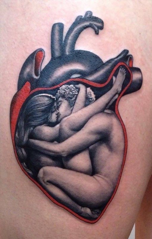 Lovers in human heart tattoo