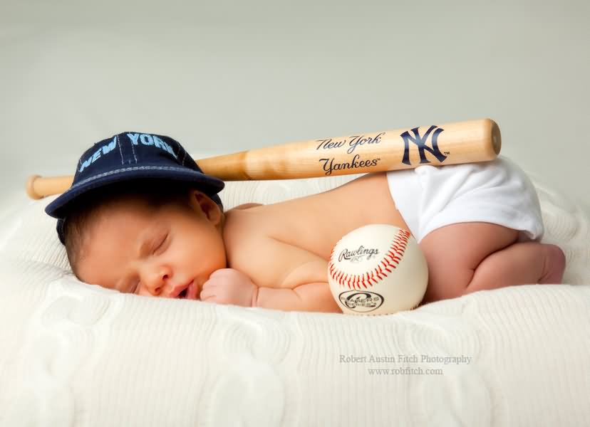 Newborn Baby With Baseball And Base Bat