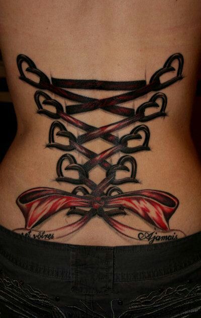 Red And Black Heart Corset Bow Tattoo On Girl Back By Bekah