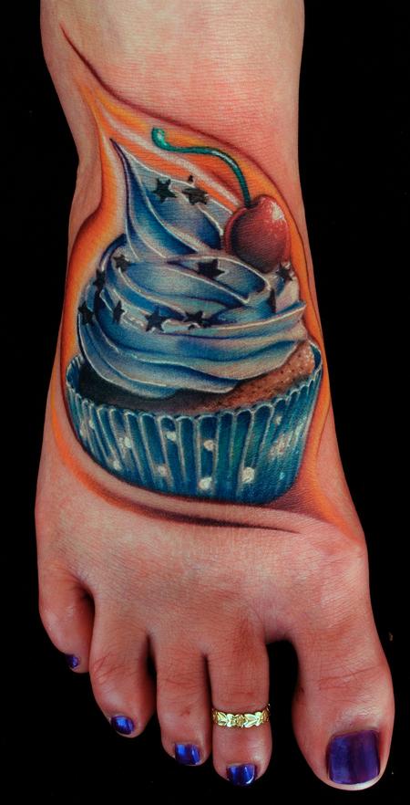 Red Cheery On Blue Cupcake Tattoo On Girl Foot
