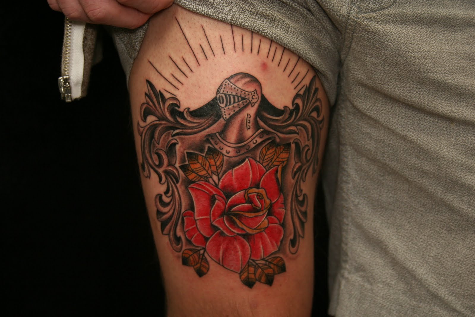 Red Rose In Black And Grey Family Crest Tattoo On Bicep