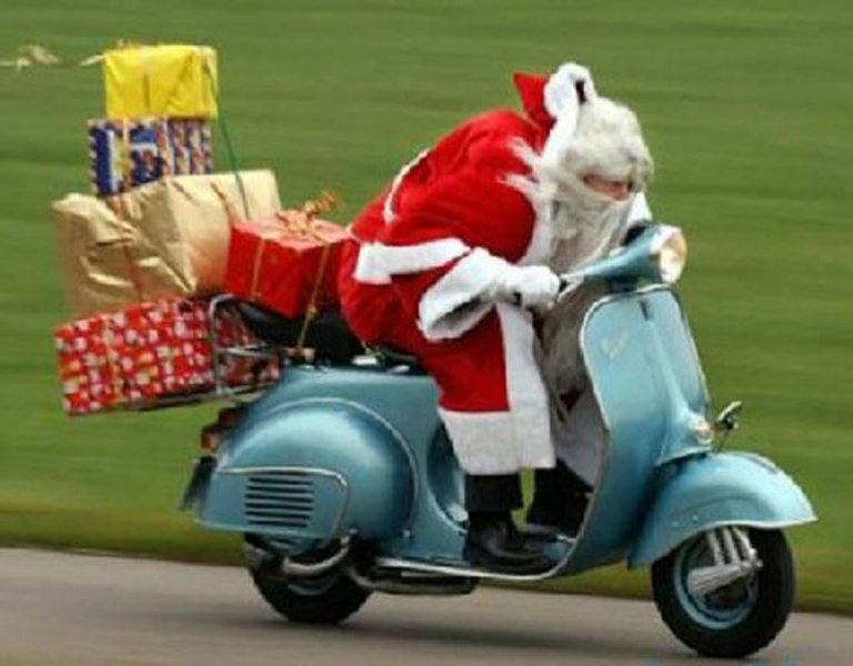 Santa Claus Going On Scooter To Distribute The Gifts Funny Christmas