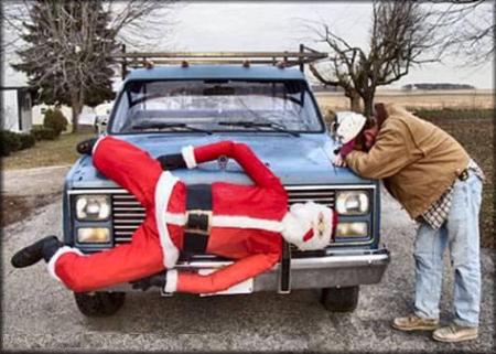 Santa Claus Statute Hanging Front Of Car Funny Christmas