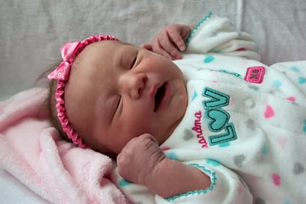 Sweet Newborn Baby With Pink Bow Headband