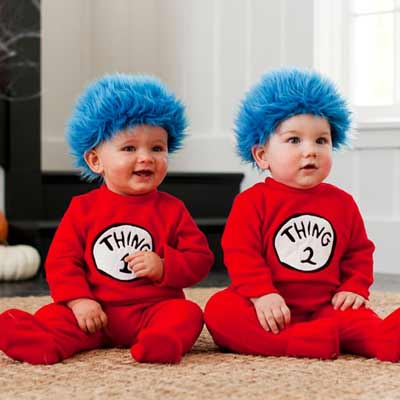 Twin Babies In Halloween Costume And Blue Wigs