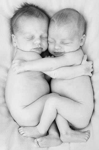 Twin Babies Sleeping Hugging Each Other