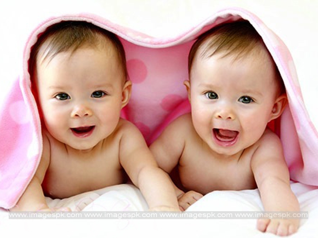 Twin-Babies-Under-Towel.jpeg