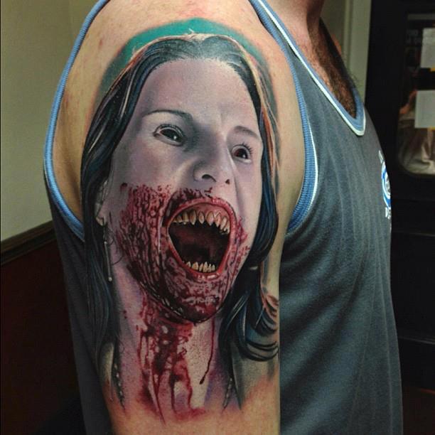3D Horror Vampire Face Tattoo On Man Shoulder