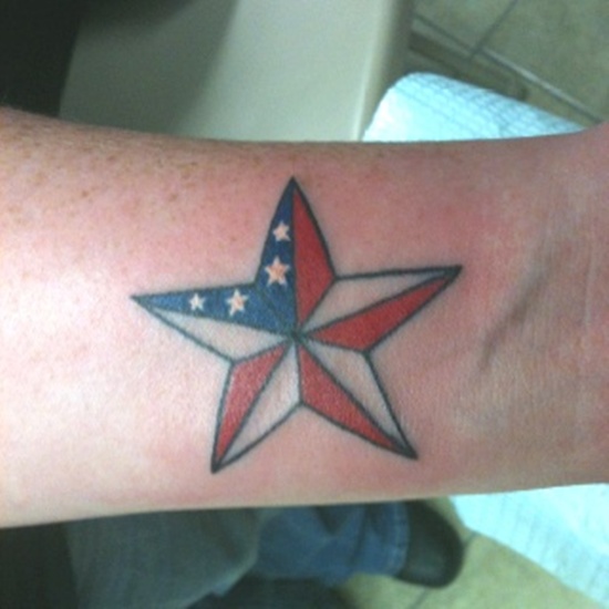American Flag In Nautical Star Tattoo On Wrist