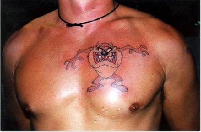 Angry Taz Cartoon Tattoo On Man Chest