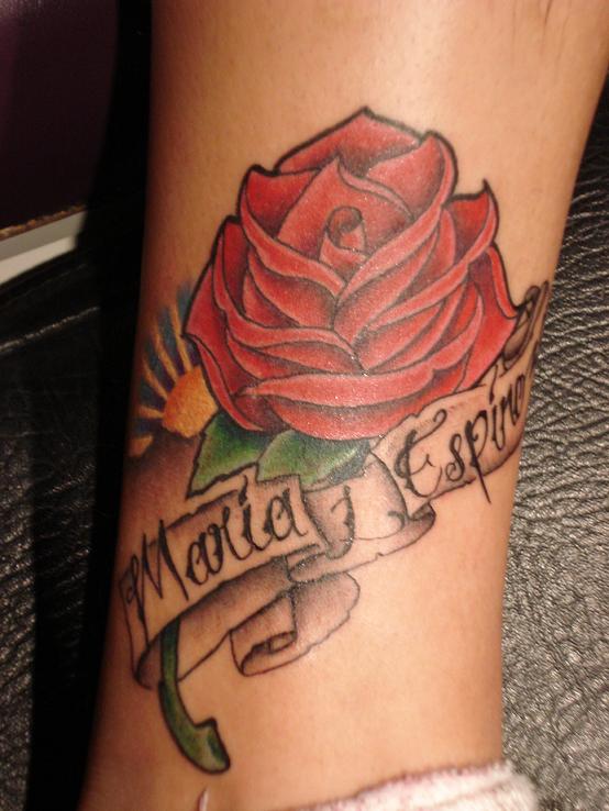 Big red rose tattoo by Fabian Cobos