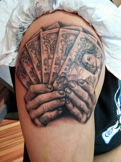 Black And Grey 3D Money In Hand Tattoo On Girl Shoulder