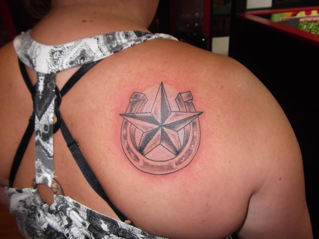 Black And Grey 3D Nautical Star In Horseshoe Tattoo On Girl Back Shoulder