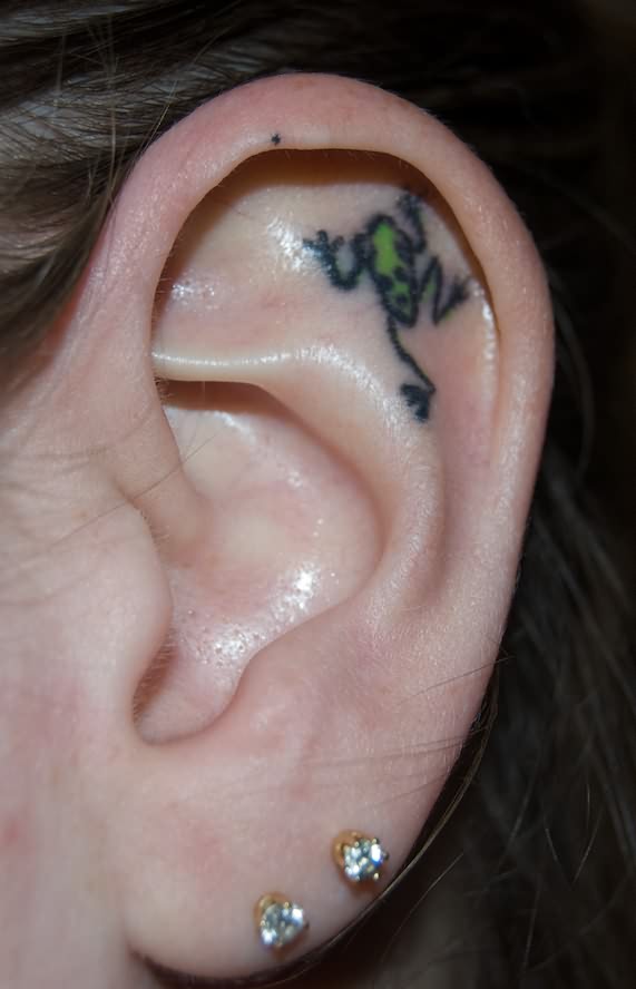 Black And Grey Frog Tattoo On Girl Inside The ear