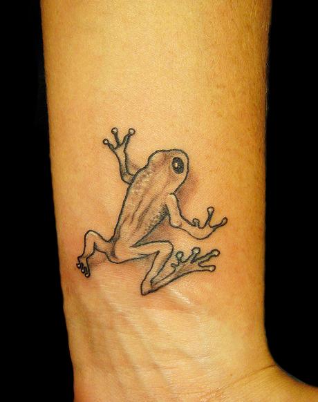 Black And Grey Frog Tattoo On Wrist