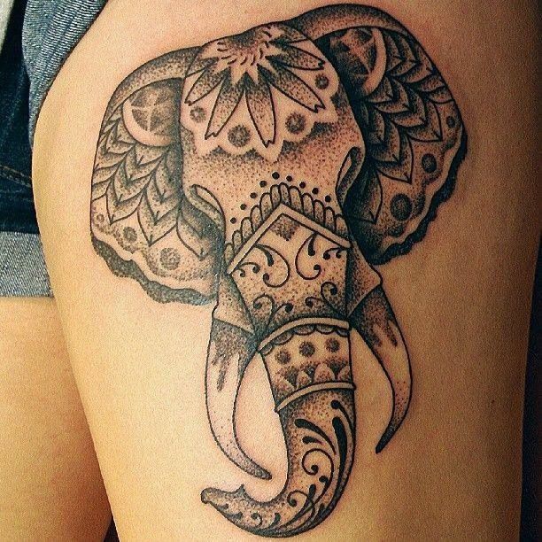 Black And Grey Polynesian Elephant Head Tattoo On Back Thigh