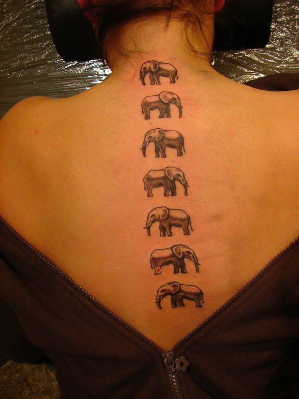 Black And Grey Seven Little Elephants Tattoo On Upper Back By Darius Puodziukas