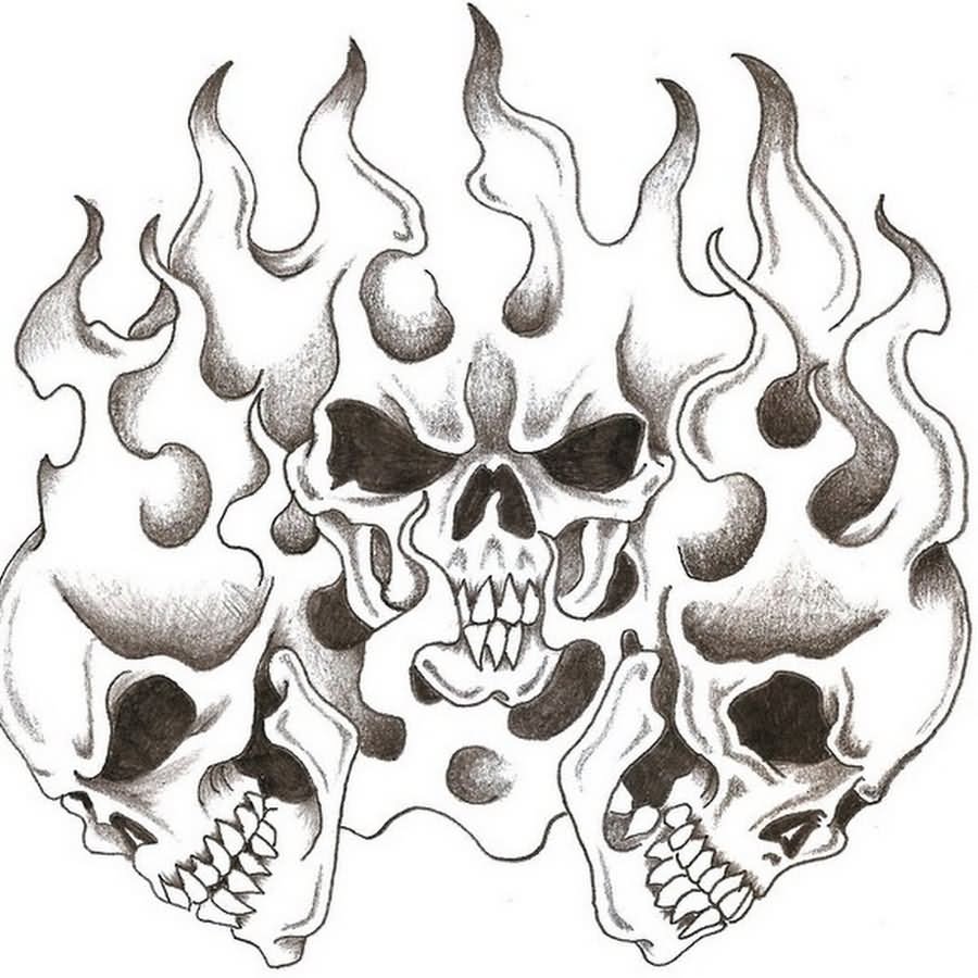 Black And Grey Three Skull In Flame Tattoo Design By Steve Laube