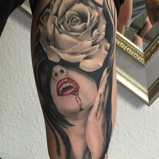 Black And Grey Vampire Girl With Rose Tattoo Design
