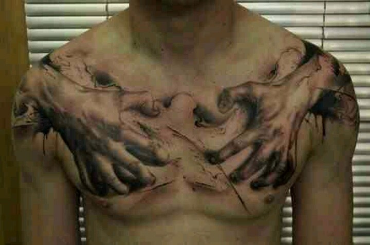 Black And Grey Zombie Hand On Man Chest