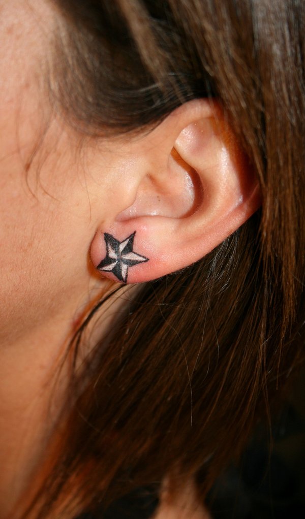 Black And White Nautical Star Tattoo On Ear By 2Face Tattoo