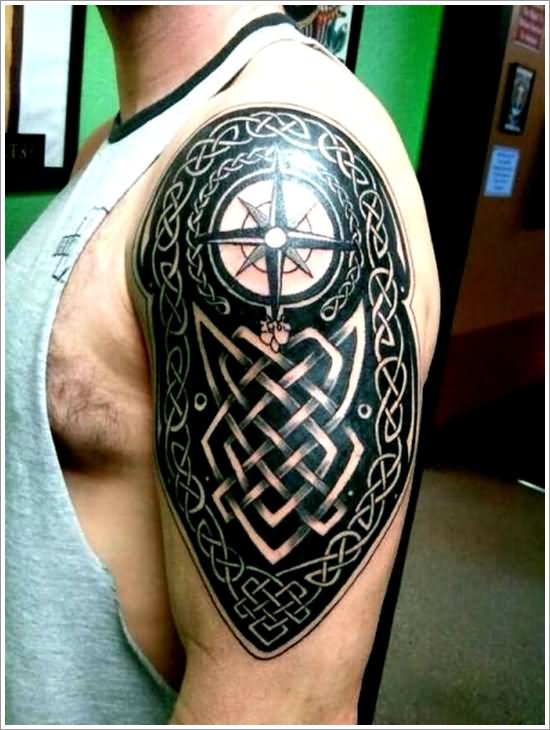Black Celtic Compass Tattoo On Man Left Shoulder