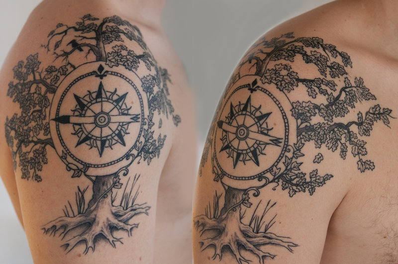 Black Compass In Tree Tattoo On Man Shoulder By Timo Penttilä