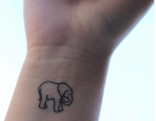 Black Elephant Calf Tattoo On Wrist