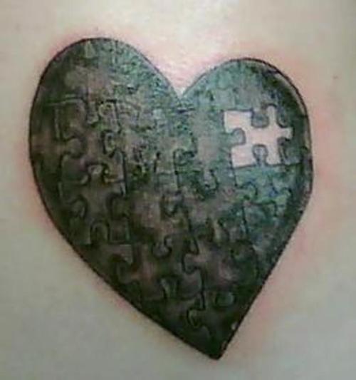 Black Heart Puzzle Tattoo Design