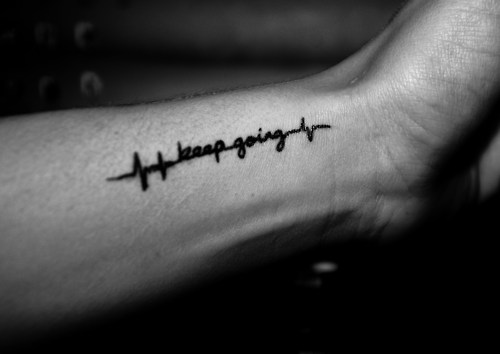 Black Heartbeat Keep Going Tattoo On Side Wrist