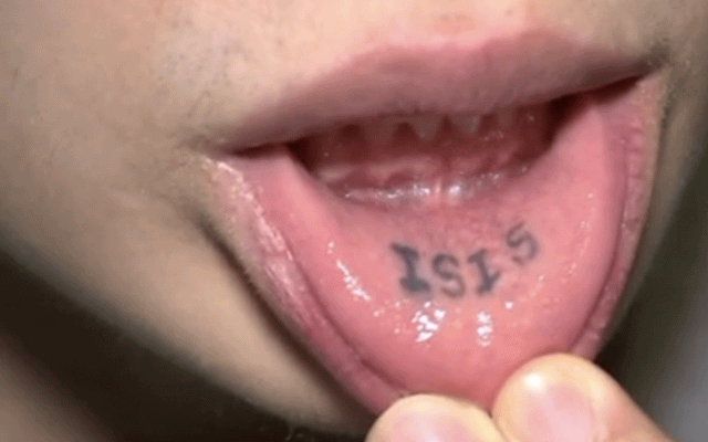 Black Isis Tattoo On Girl Inner Lip