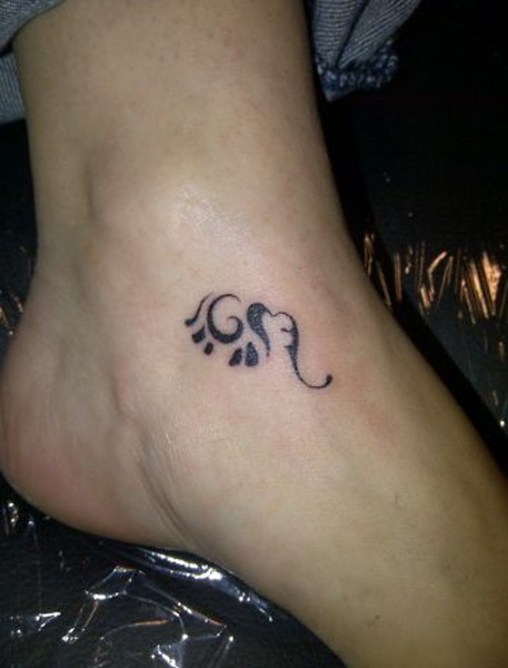 Black Little Tribal Elephant Calf Tattoo On Ankle
