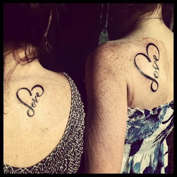 Black Love Heart Tattoo On Daughters Back Shoulder