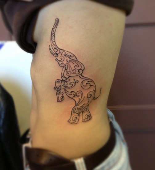 Black Maori Elephant Tattoo On Side Rib