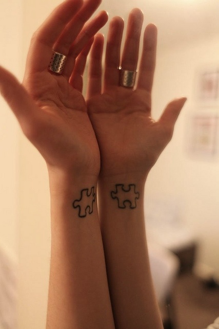 Black Puzzle Tattoo On Both Wrist