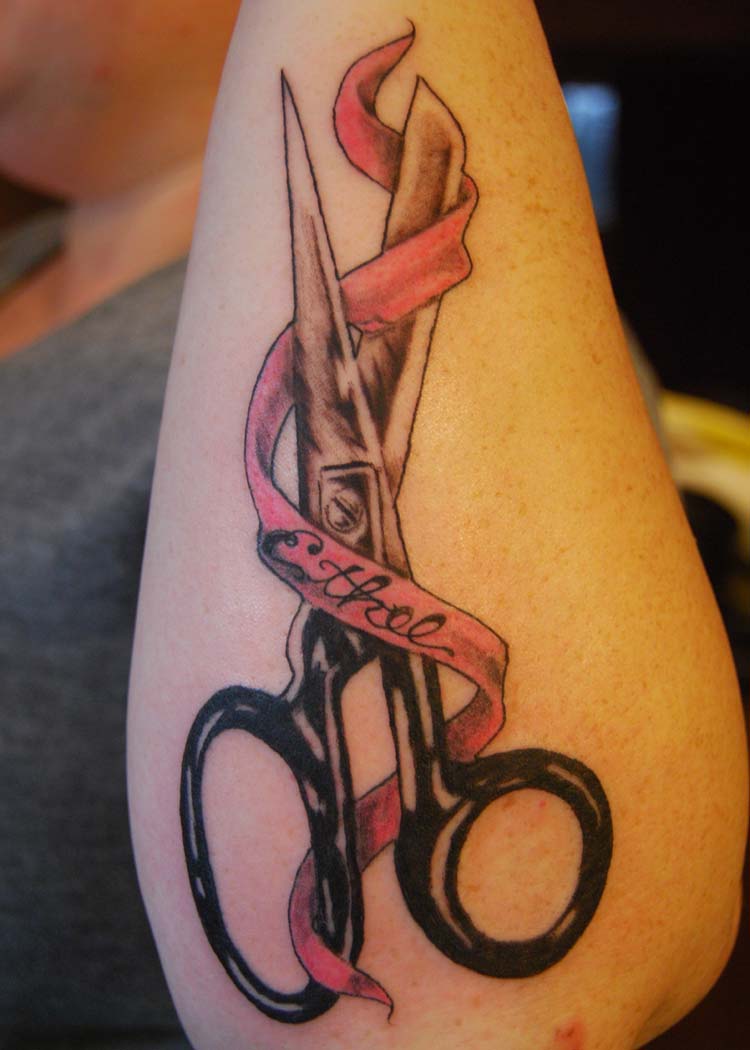 Black Scissor With Pink Banner Tattoo On Forearm By Nathan Britton