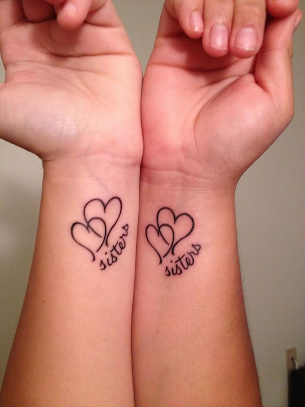 Black Two Heart With Sister Word Tattoo On Both Wrist