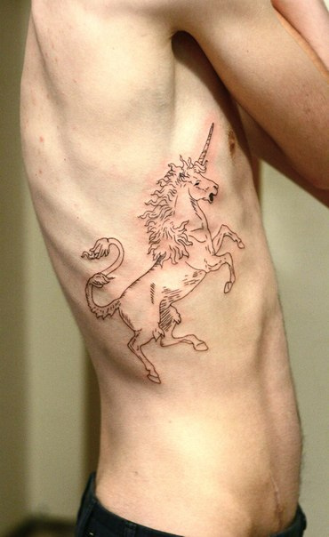 Black Unicorn Tattoo On Man Side Rib By Diana Katsko