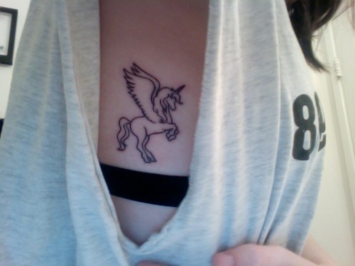 Black Unicorn With Flying Wings Tattoo On Girl Upper Side Rib